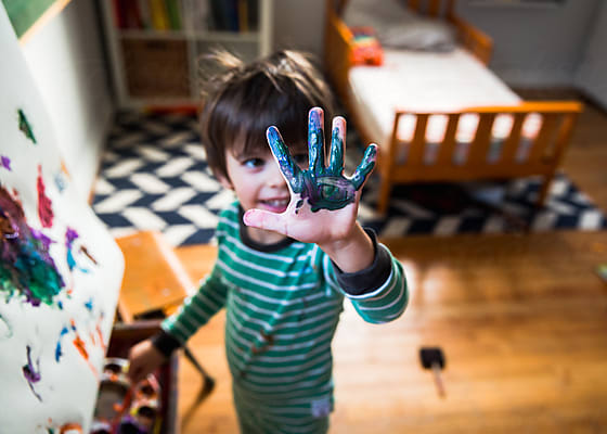 Little Girl Painting At Easle In Diaper by Stocksy Contributor Maria  Manco - Stocksy