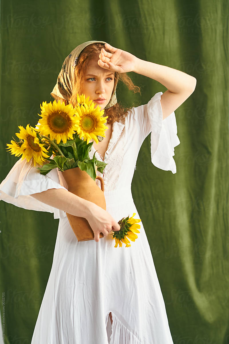 A girl with sunflowers