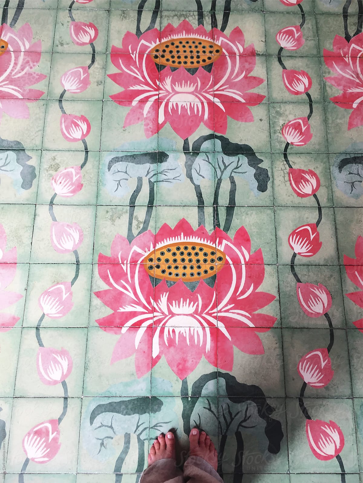 Bare Feet On Beautiful Pink And Green Lotus Tiles In Temple by Stocksy  Contributor Holly Clark - Stocksy