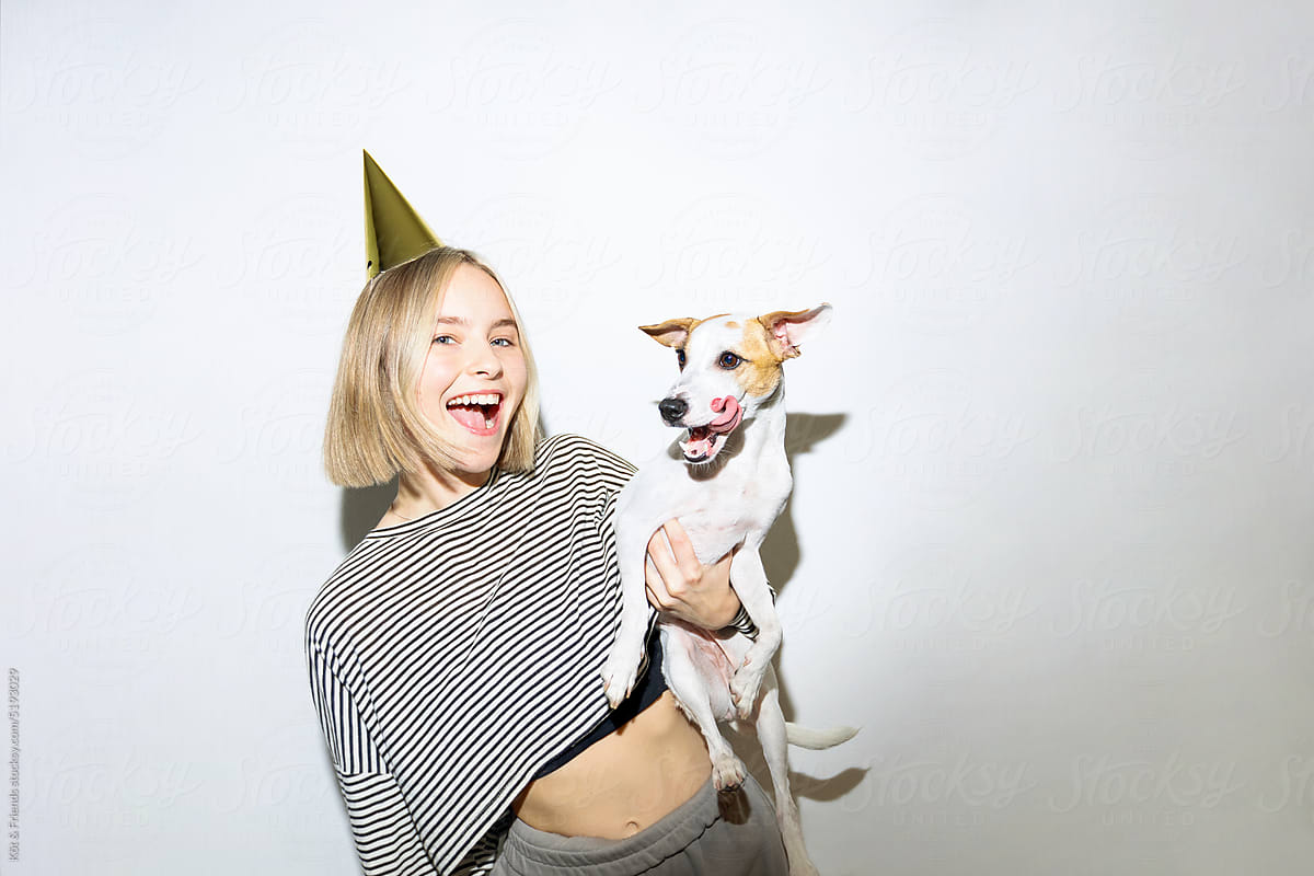 Direct Flash Portrait Of Excited Woman And Dog