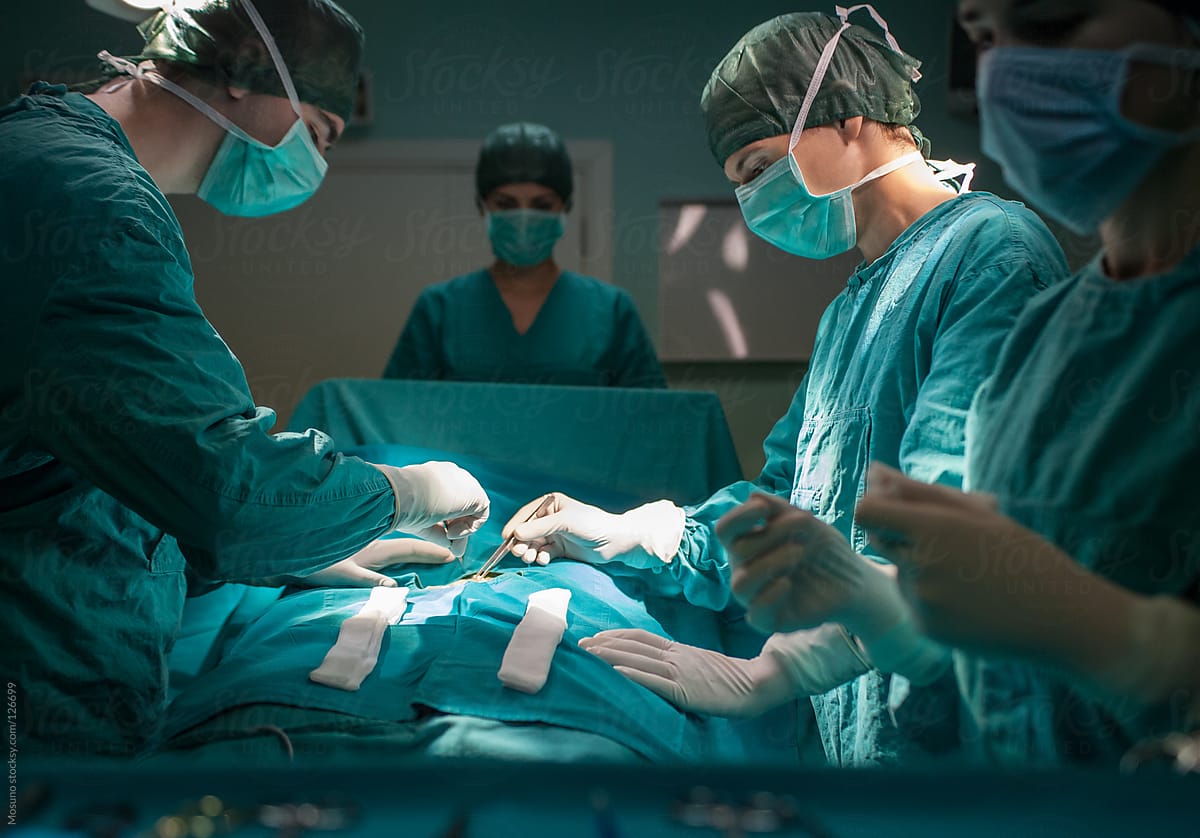 Group of Surgeons Operating on a Patient