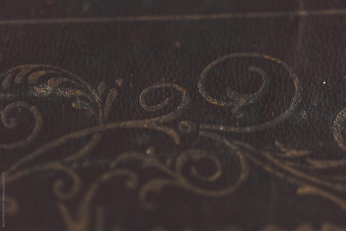 Antique Scrollwork On A Leather Book Cover