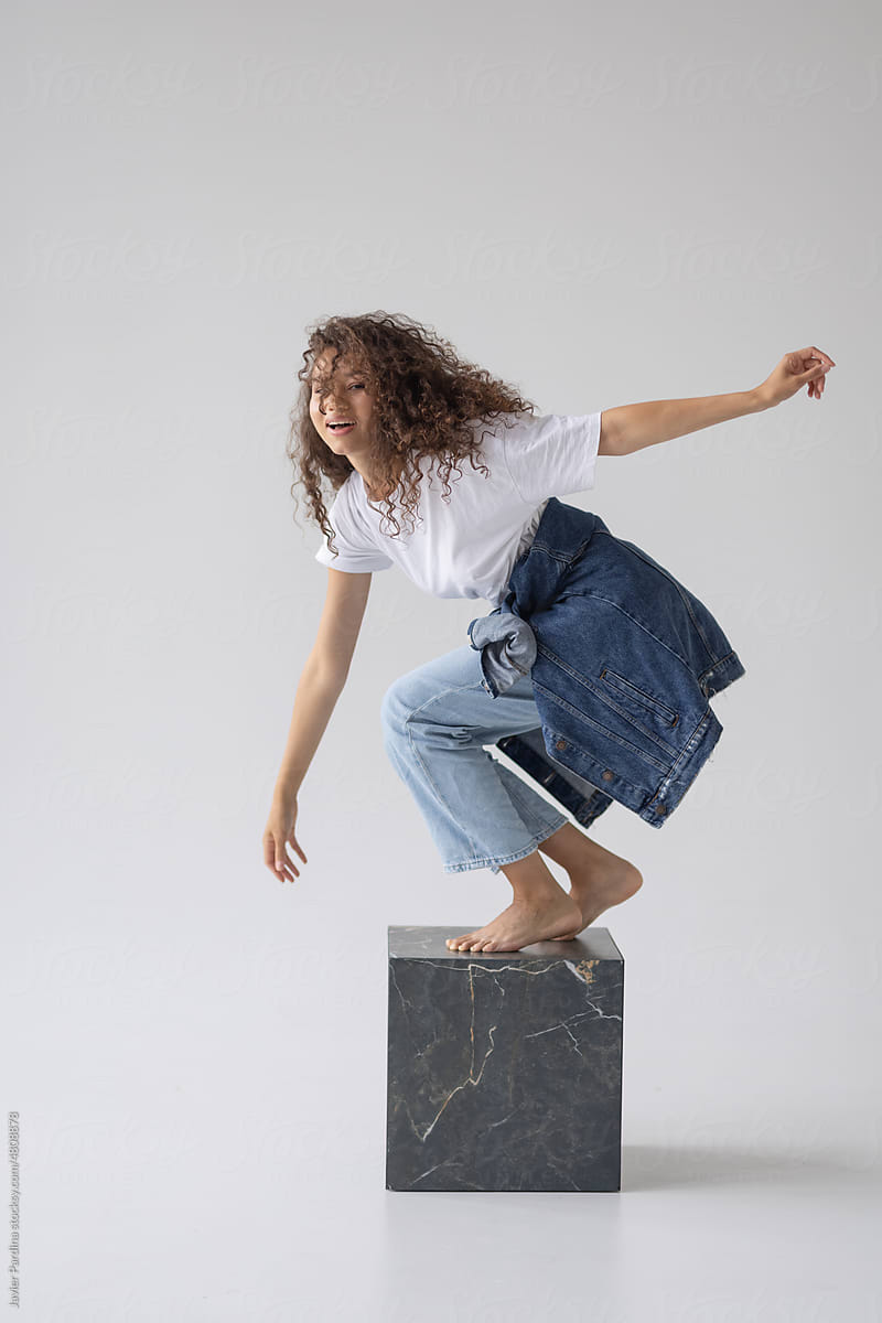 Woman on a cube