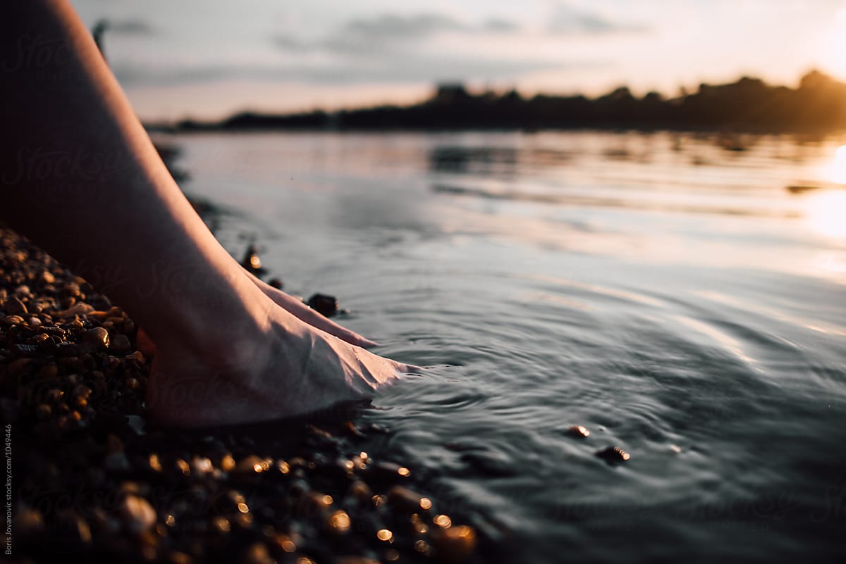 Close Up Of Legs In The Water By Stocksy Contributor Boris Jovanovic Stocksy