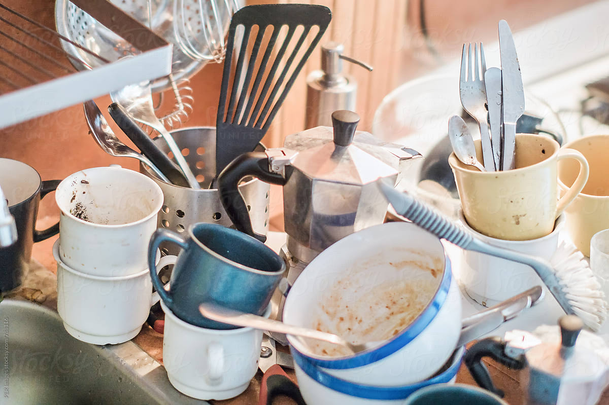 Kitchen procrastination mess: dirty dishes in a home kitchen