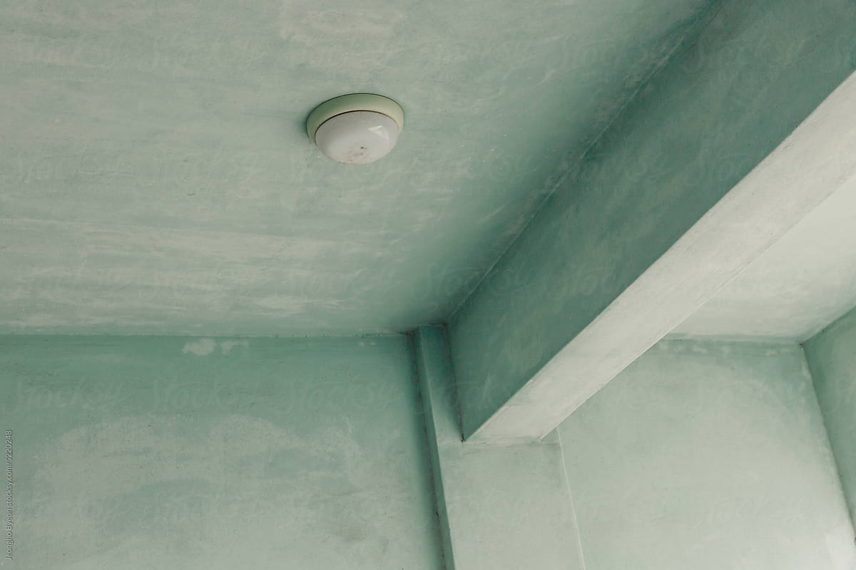 Corner of a building ceiling in vintage green color.