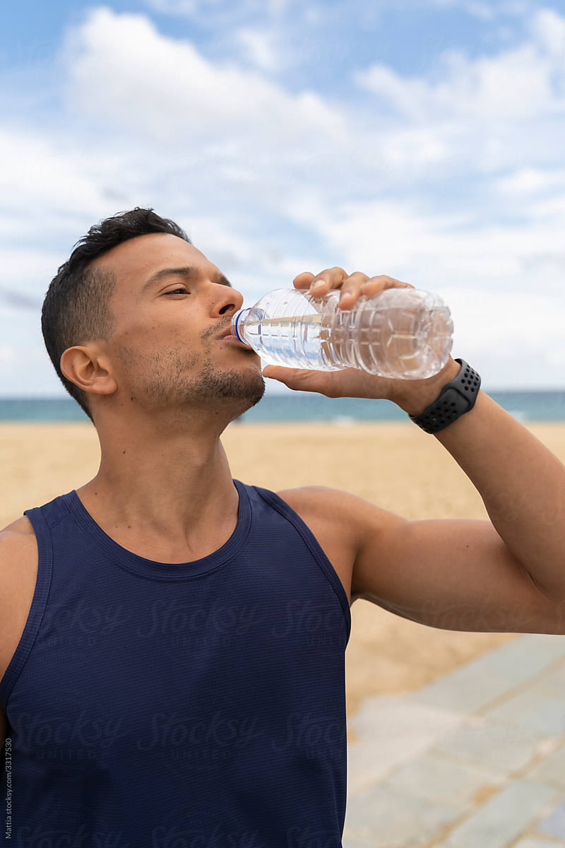 Man Drinking Water During Sport