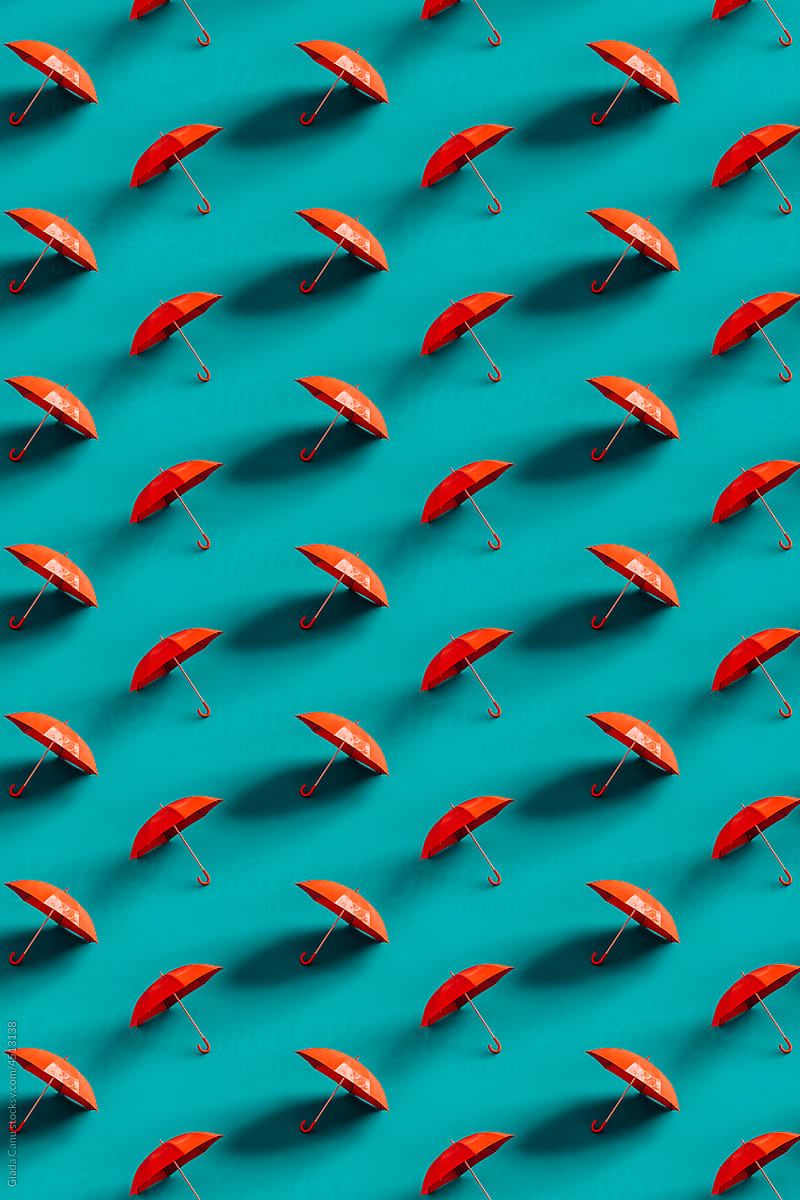 3d render of pattern of red umbrellas