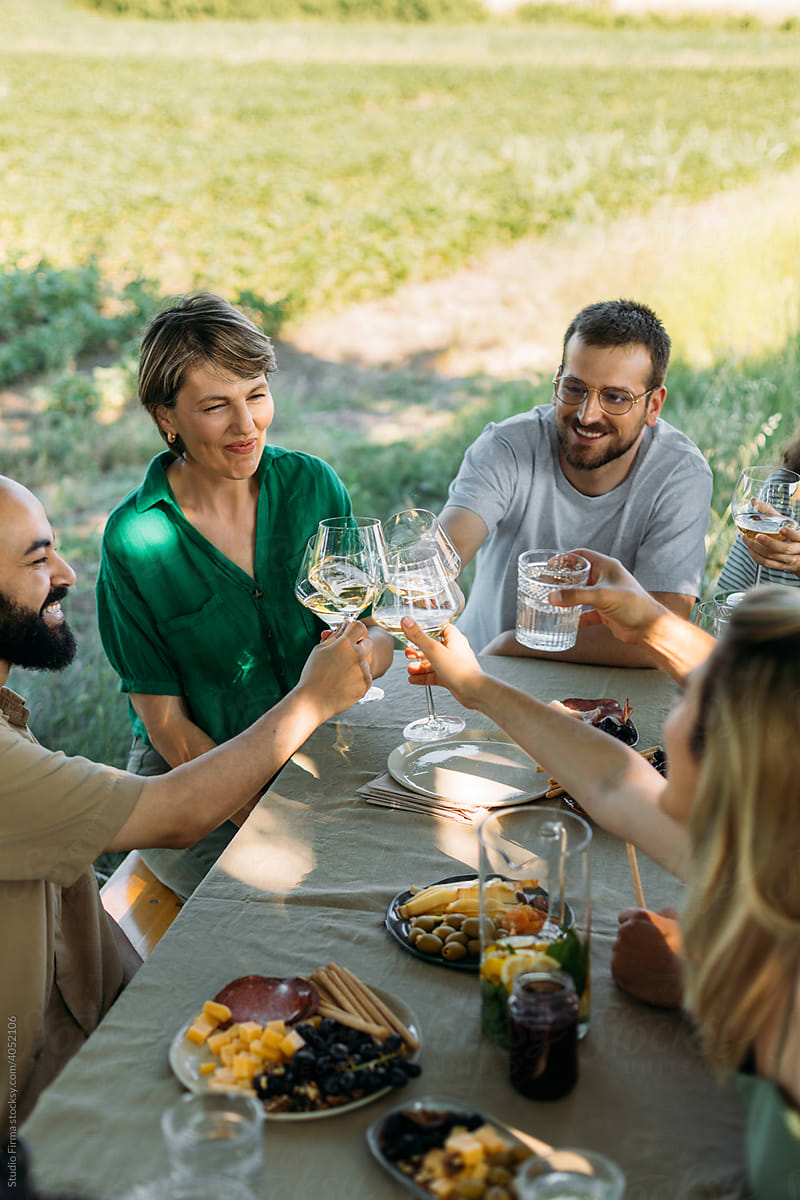 Group of People Toasting in Nature