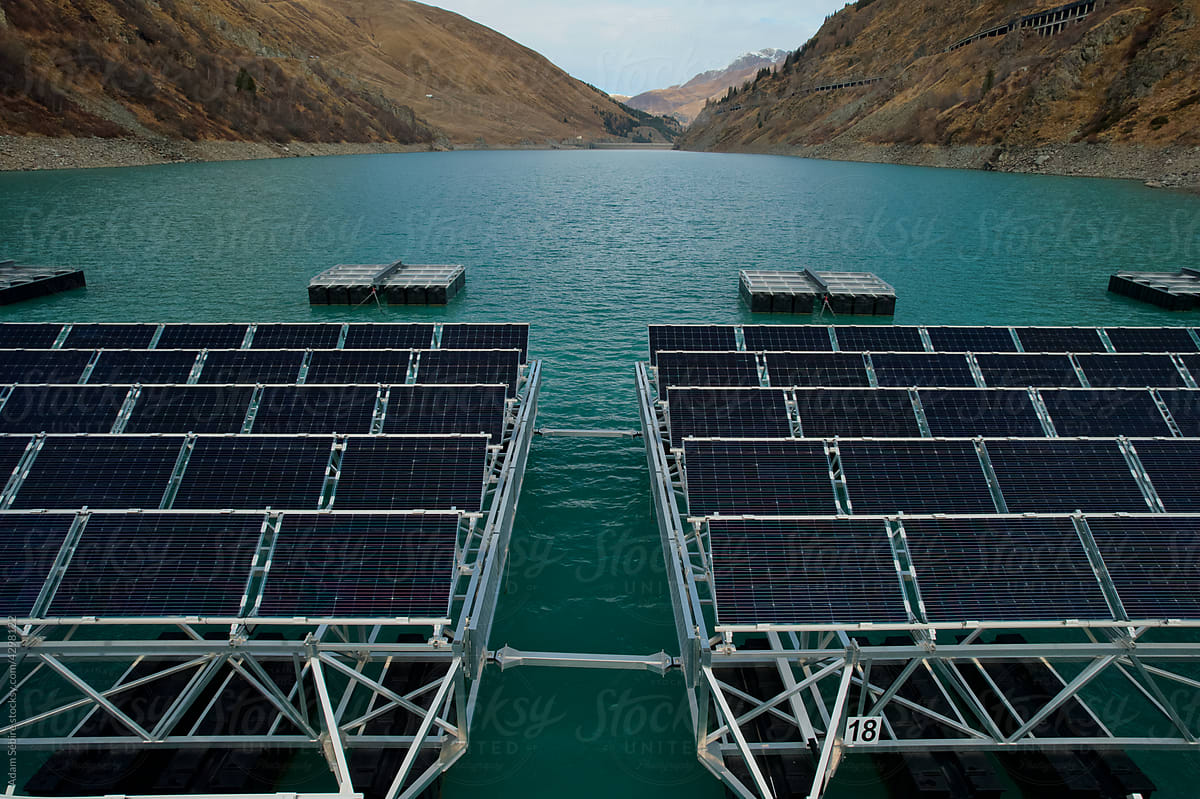 Green power energy sources, solar cells float on hydro dam