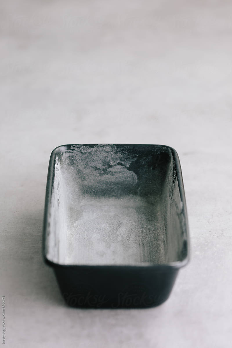 Empty floured loaf tin
