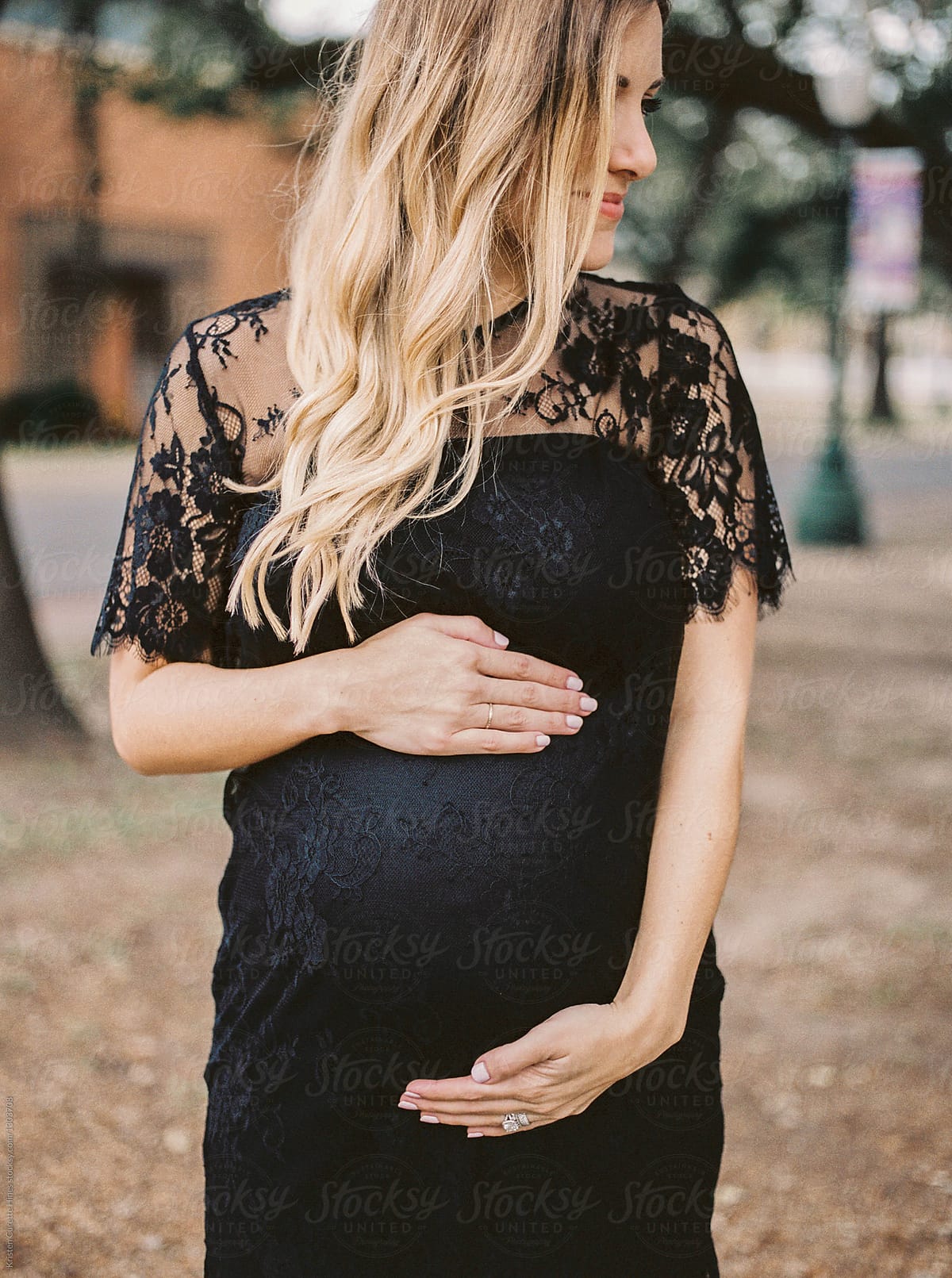 A Beautiful Woman Holding Her Belly Expecting Pregnant By Stocksy Contributor Kristen 