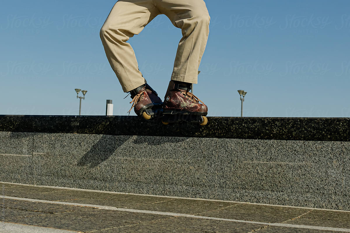 Men\'s legs in roller skates