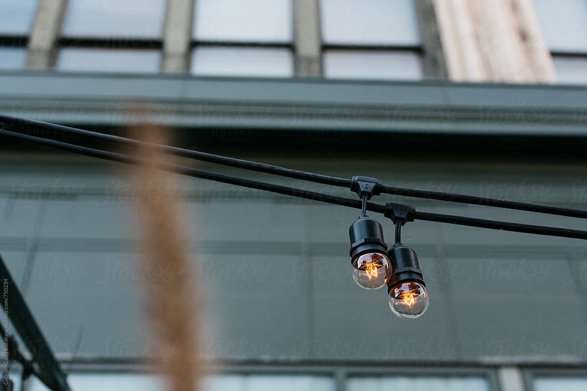 Decorative incandescent light bulbs in front of a building