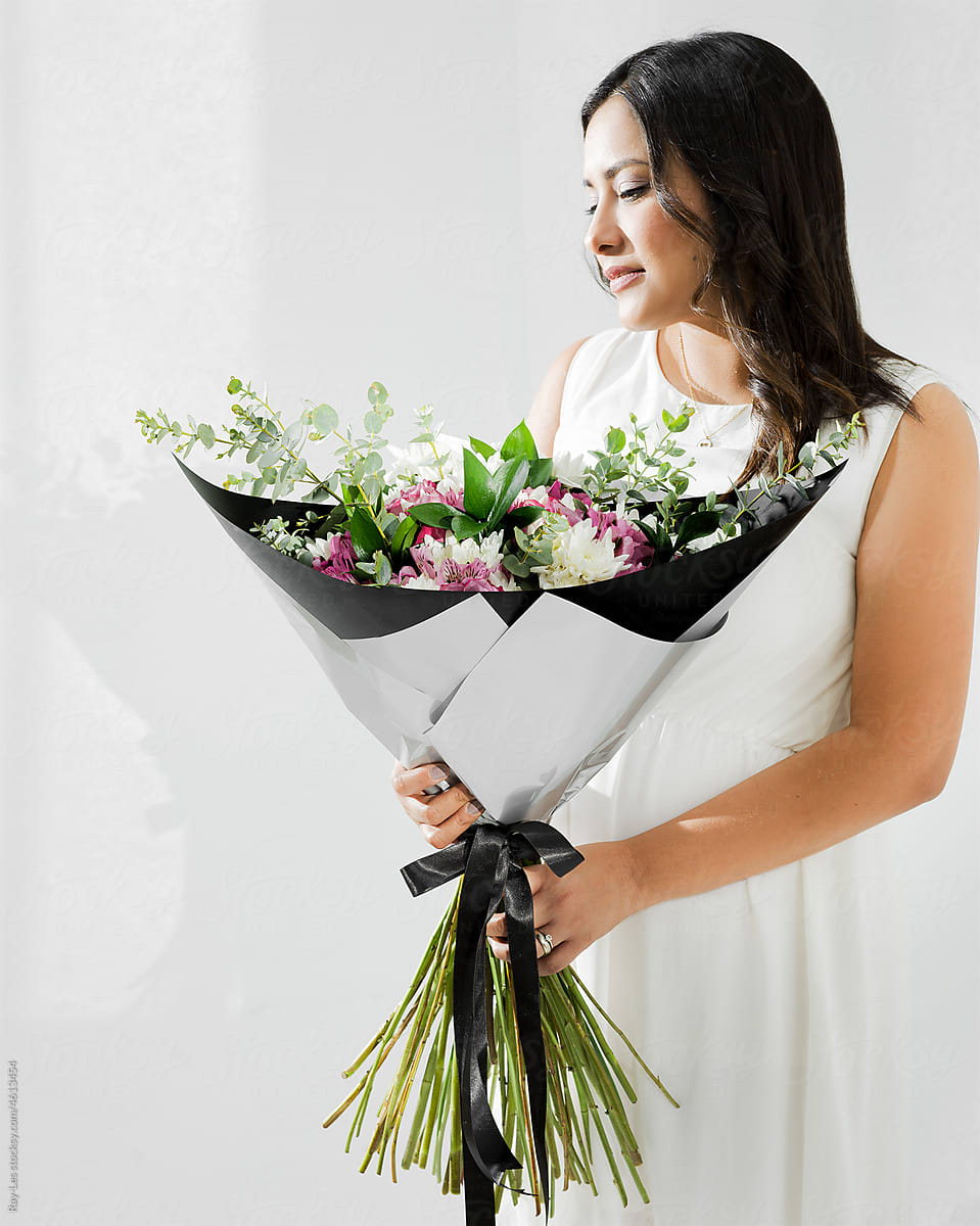 Woman  Holding  Bouquet.