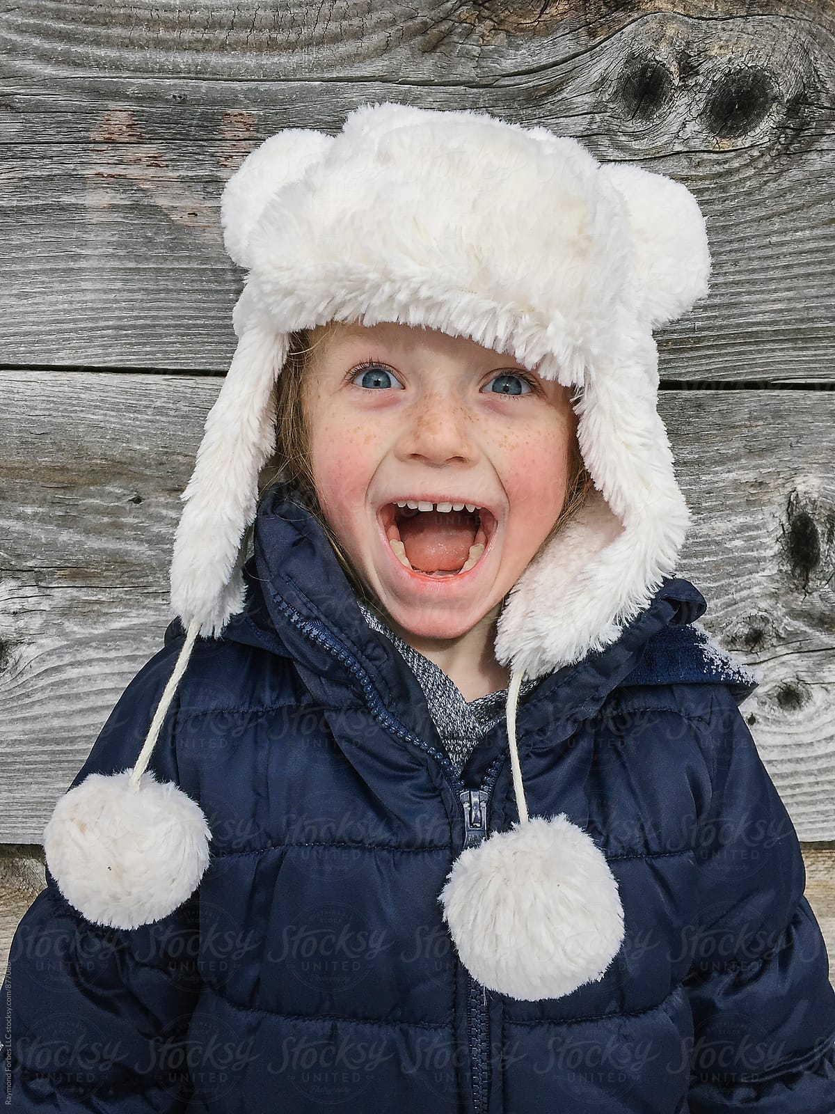 User-generated content Portrait of Child in Winter Smiling and Happy