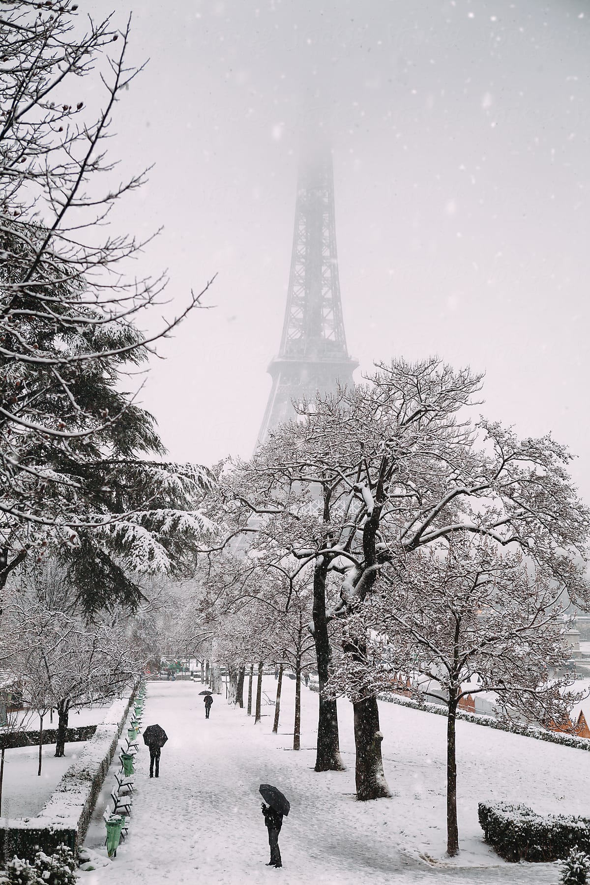 Eiffel Tower in Paris, France during a snow blizzard