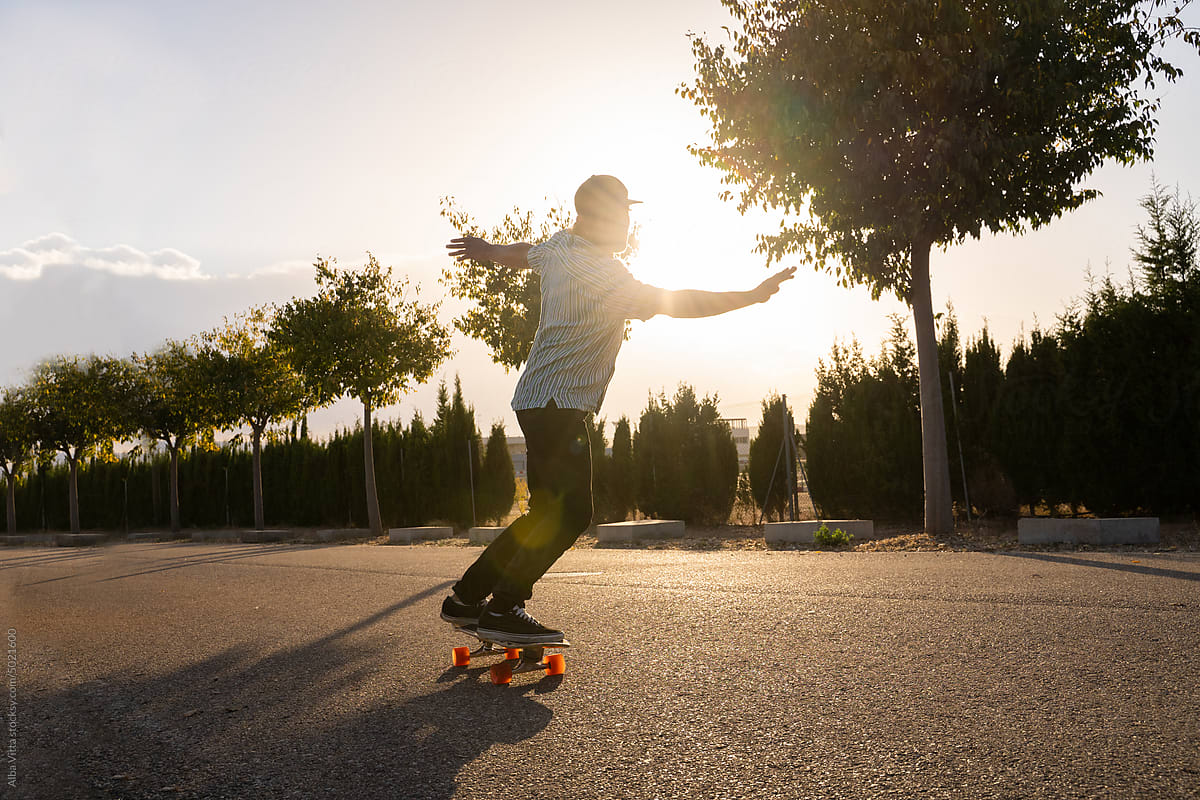 man riding skateboard outside