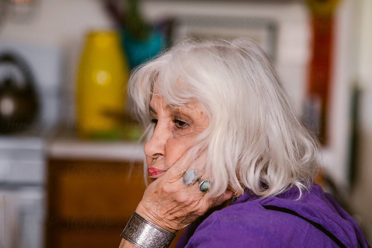 Elderly woman portrait at housing apartment