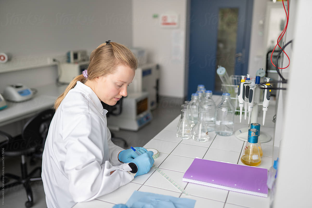 Researcher Working In Modern Luminous Laboratory