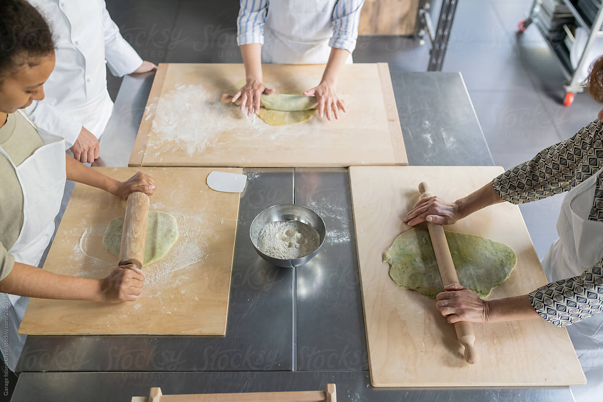 Preparing dough in a kitchen class