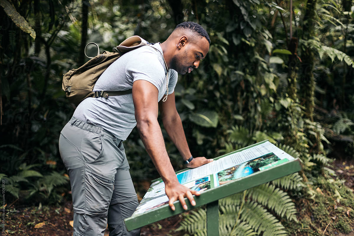 Man looking at a map of the jungle national park