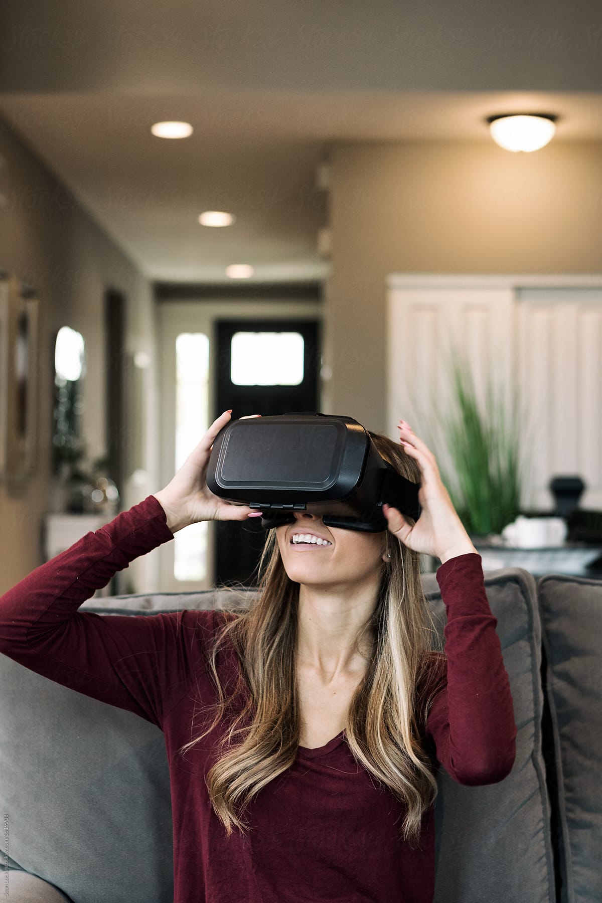 Home: Girl Puts On And Has Fun With VR Headset