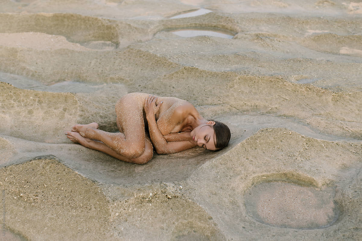 Naked Woman On Rocks