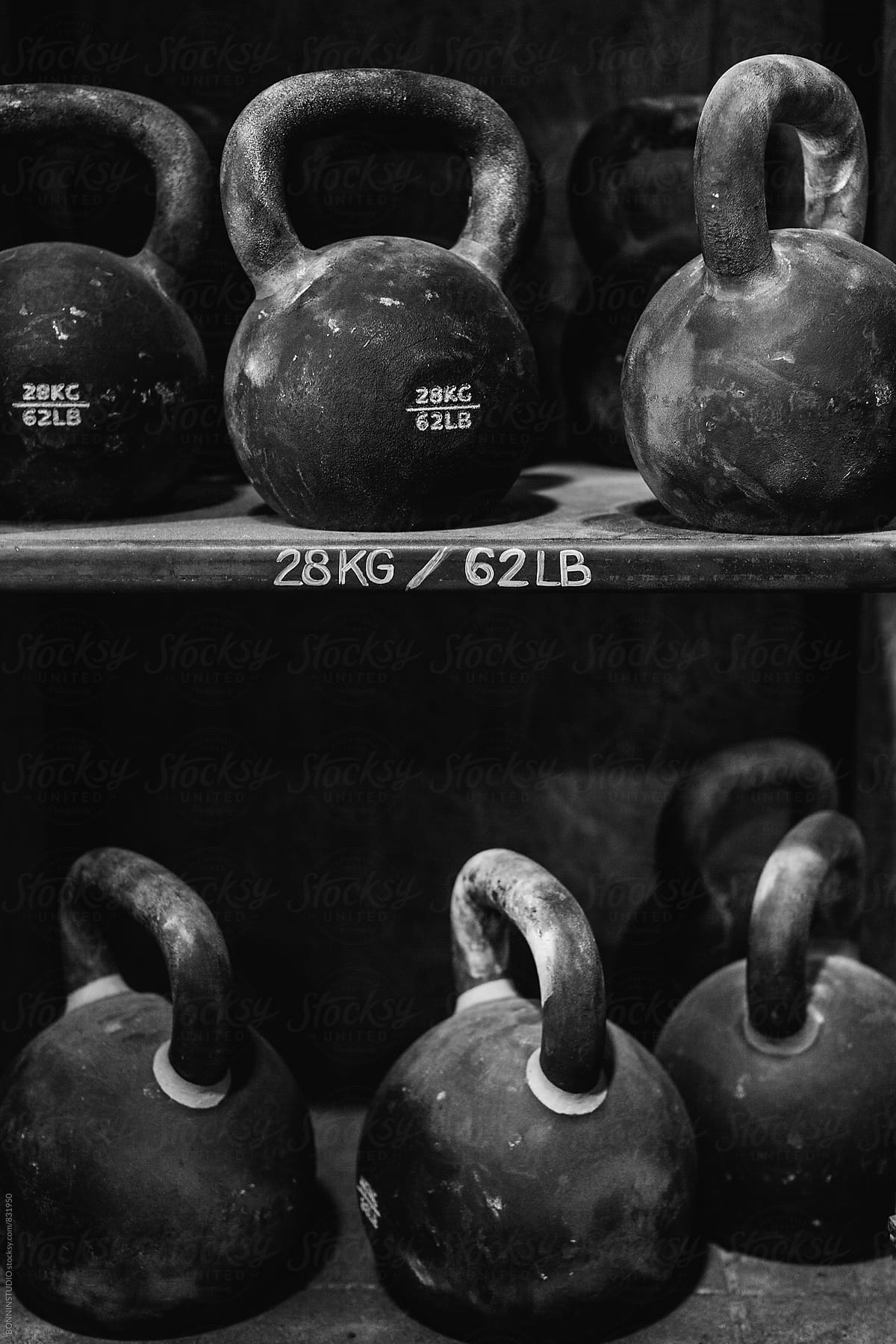 Kettlebells in a gym. Black and white photo.