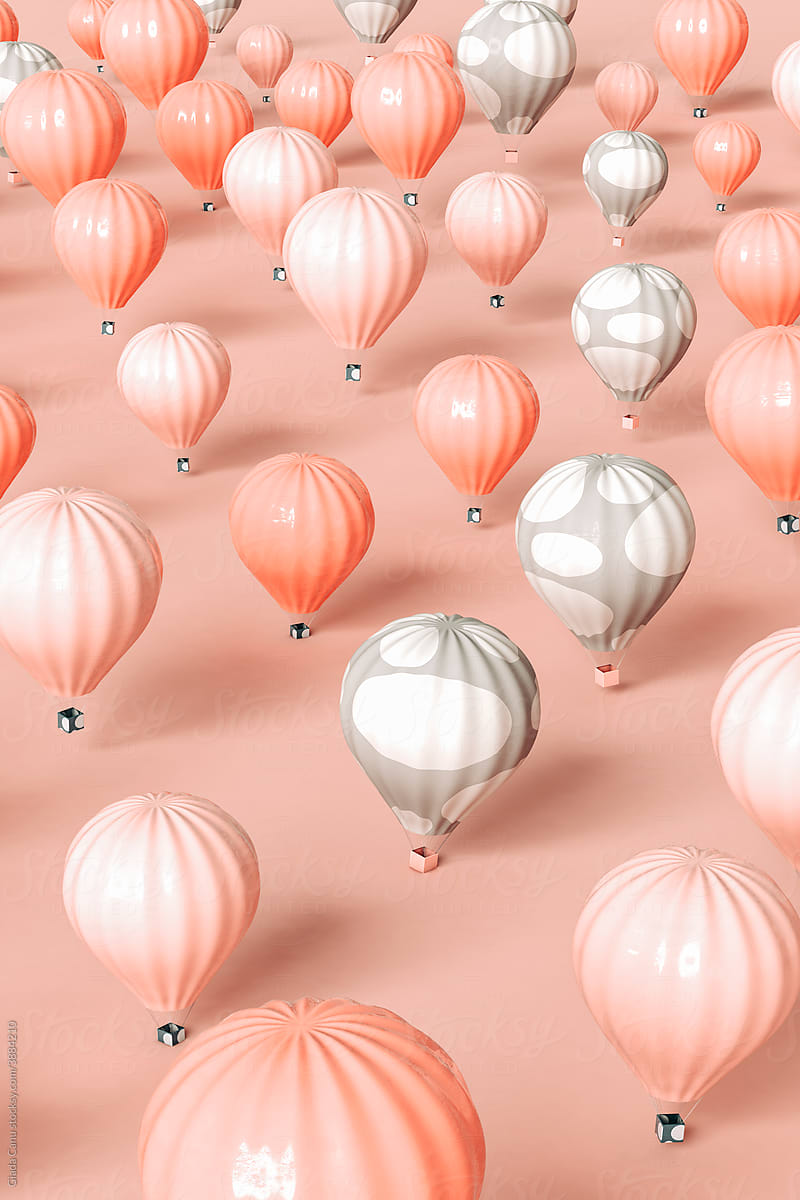 Pink and grey hot air balloon floating on pink