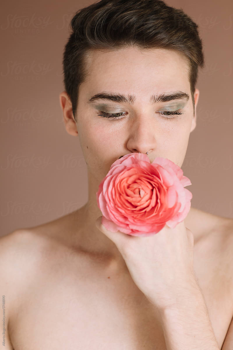 Portrait Of A Non-binary Man With Rose