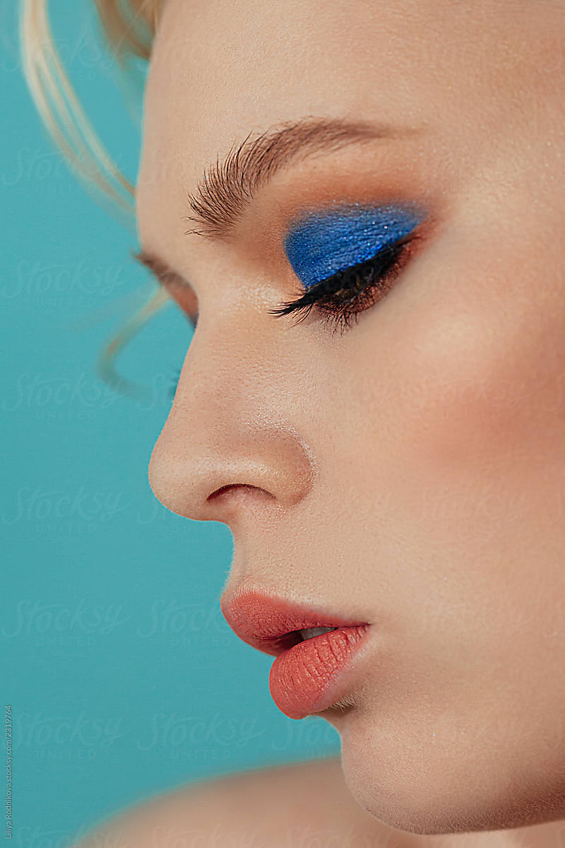 Side view crop portrait of pretty woman with stylish make up