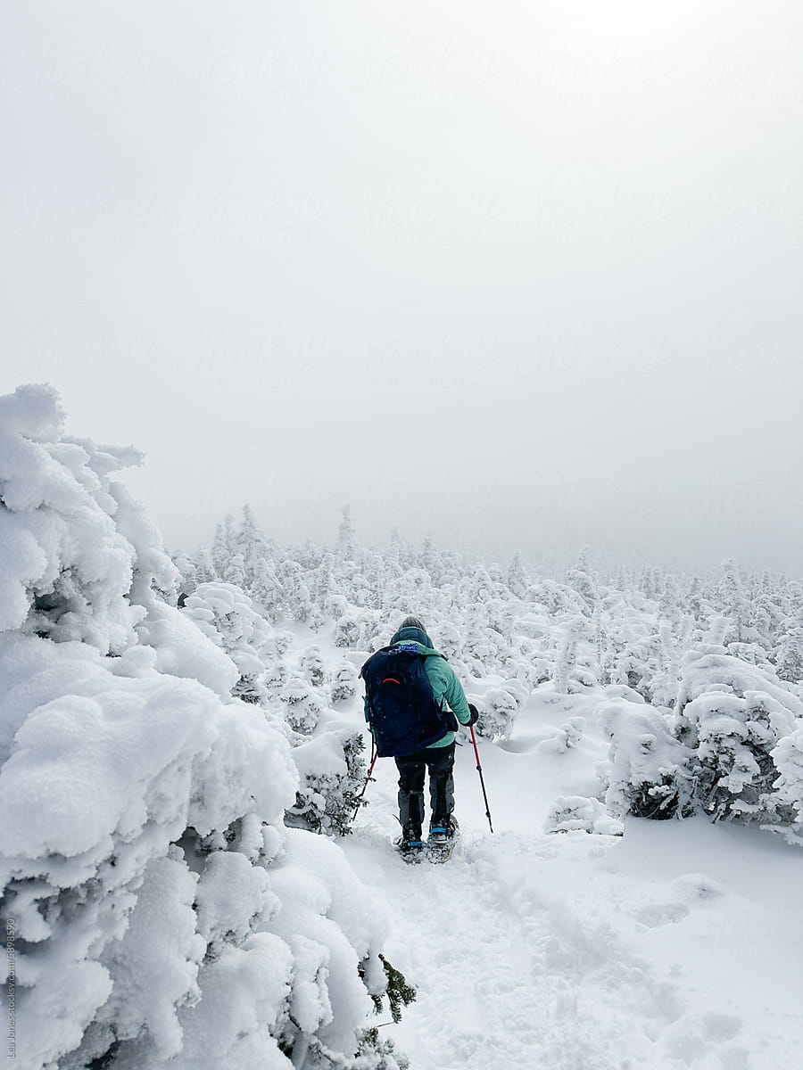UGC of person hiking in frozen landscape in White Mountains NH