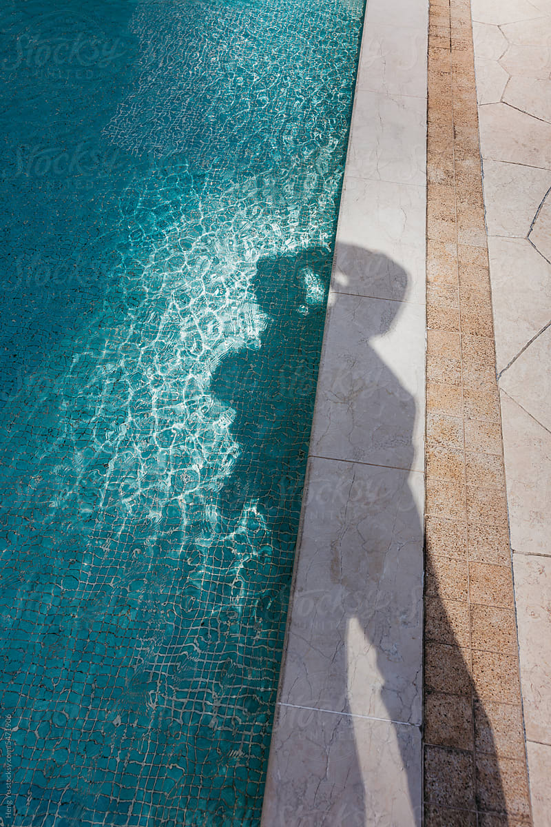human shadow with the pool