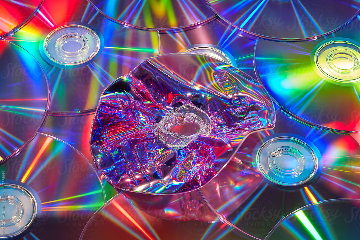 Creative seamless pattern of audio compact discs with damaged one