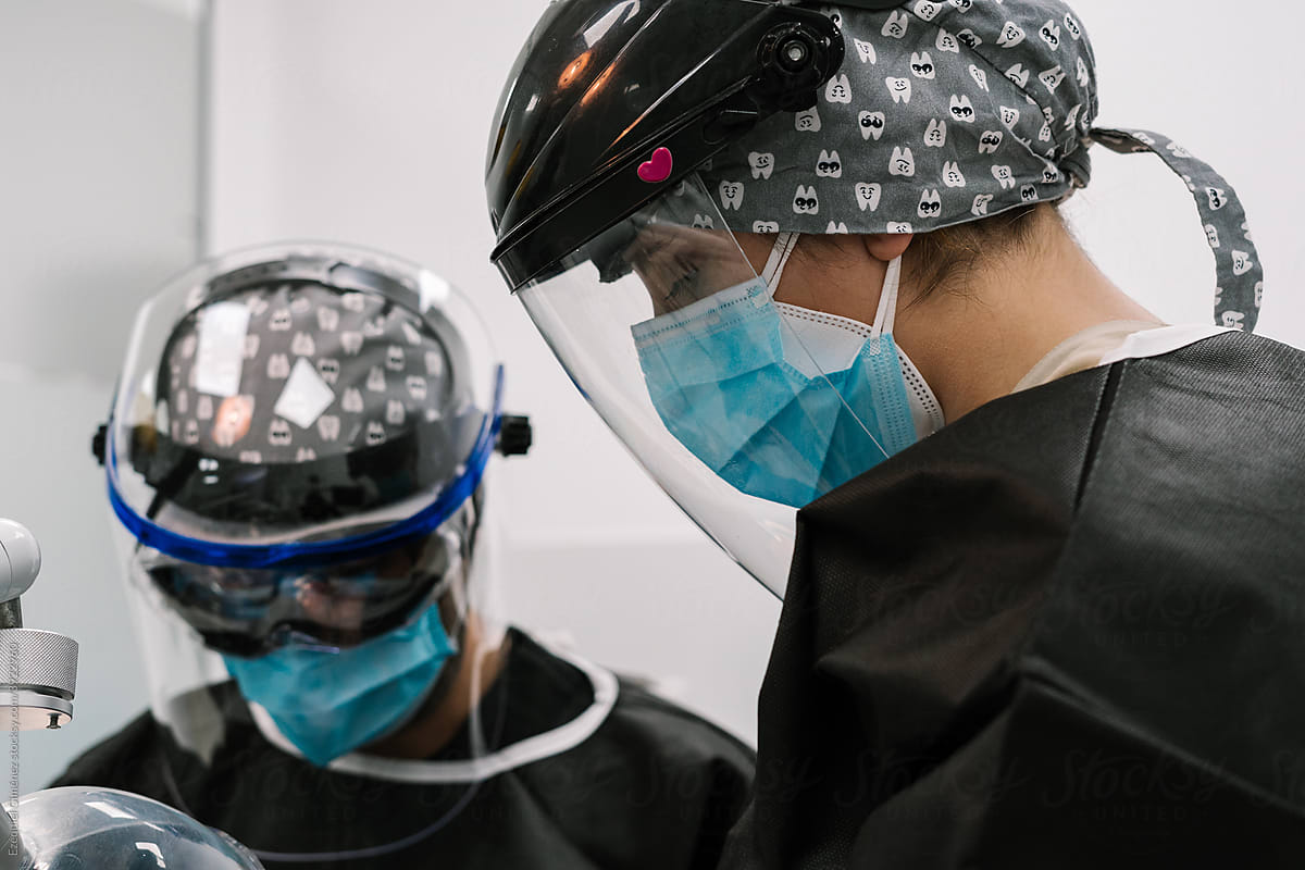 Doctors with masks in the operating room at work
