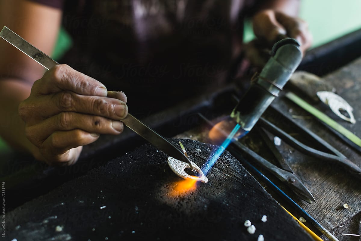 A worker making Silver jewelry