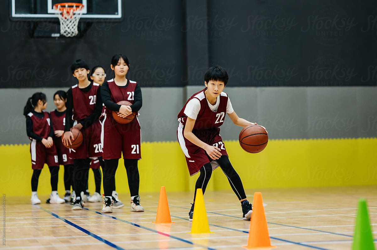 Basketball team doing drills at practice