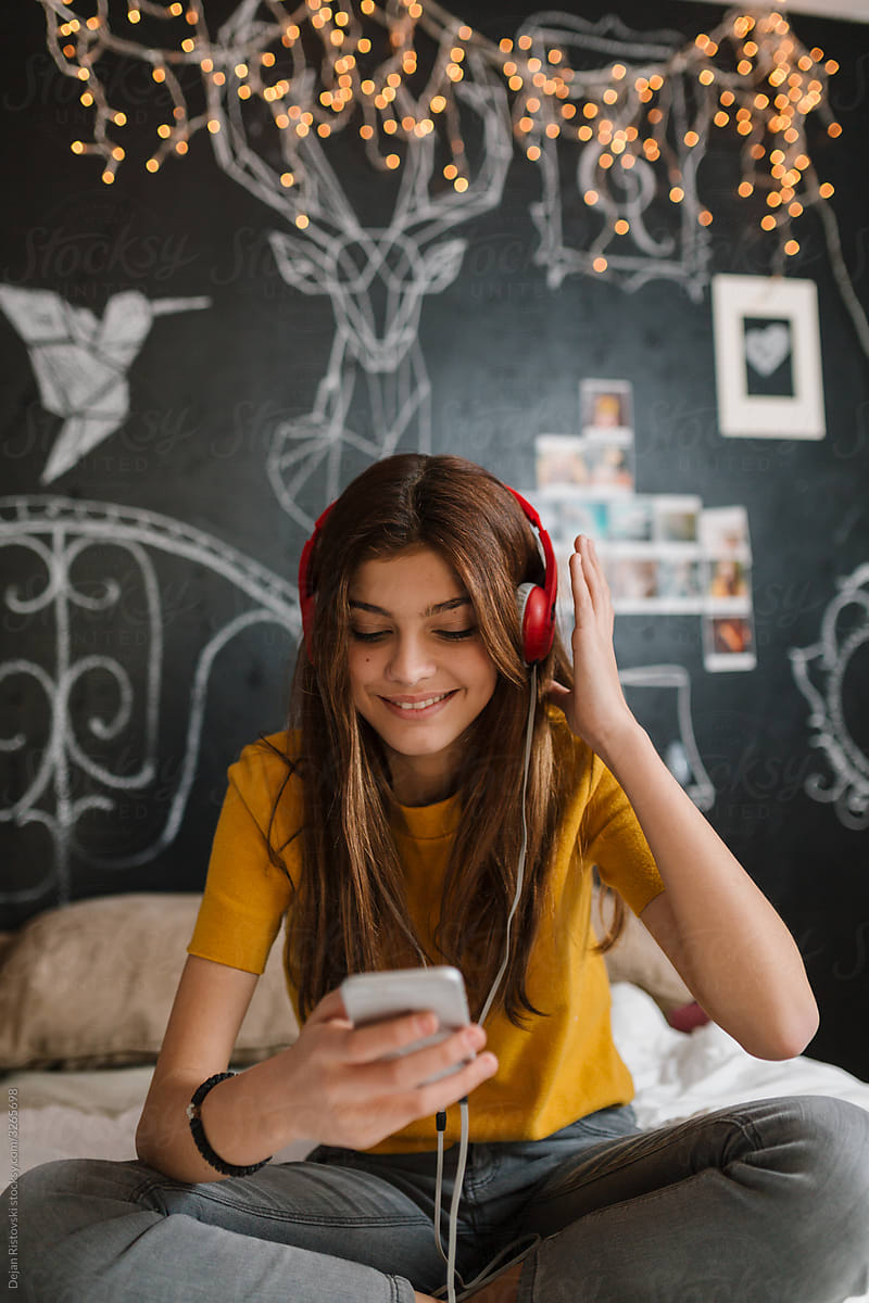 Babe Teenage Girl Having Fun Listening Music By Stocksy Contributor Dejan Ristovski Stocksy