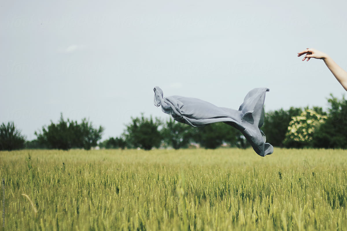 Grey scarf flying on the wind