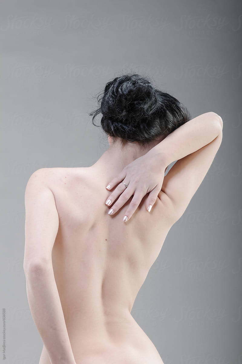 woman's back detail,naked young pretty girl, delicate skin