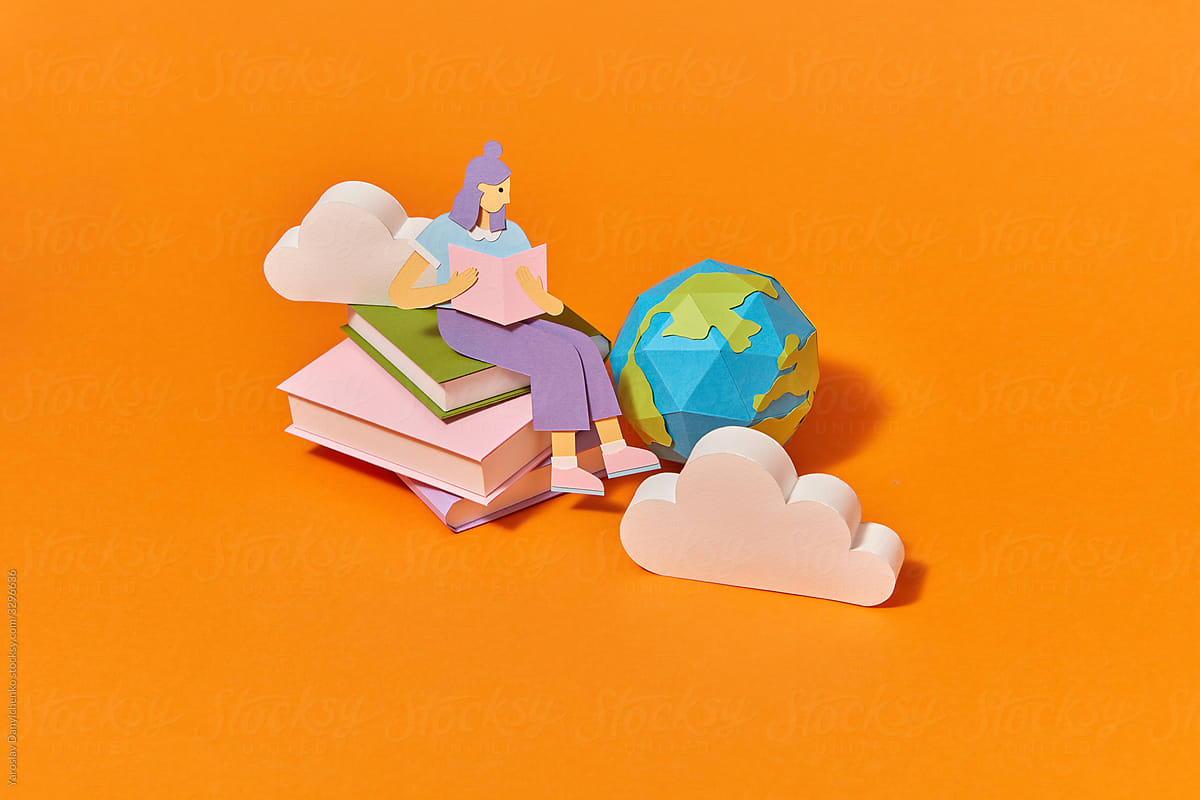 Papercraft girl is reading book from clouds storage.