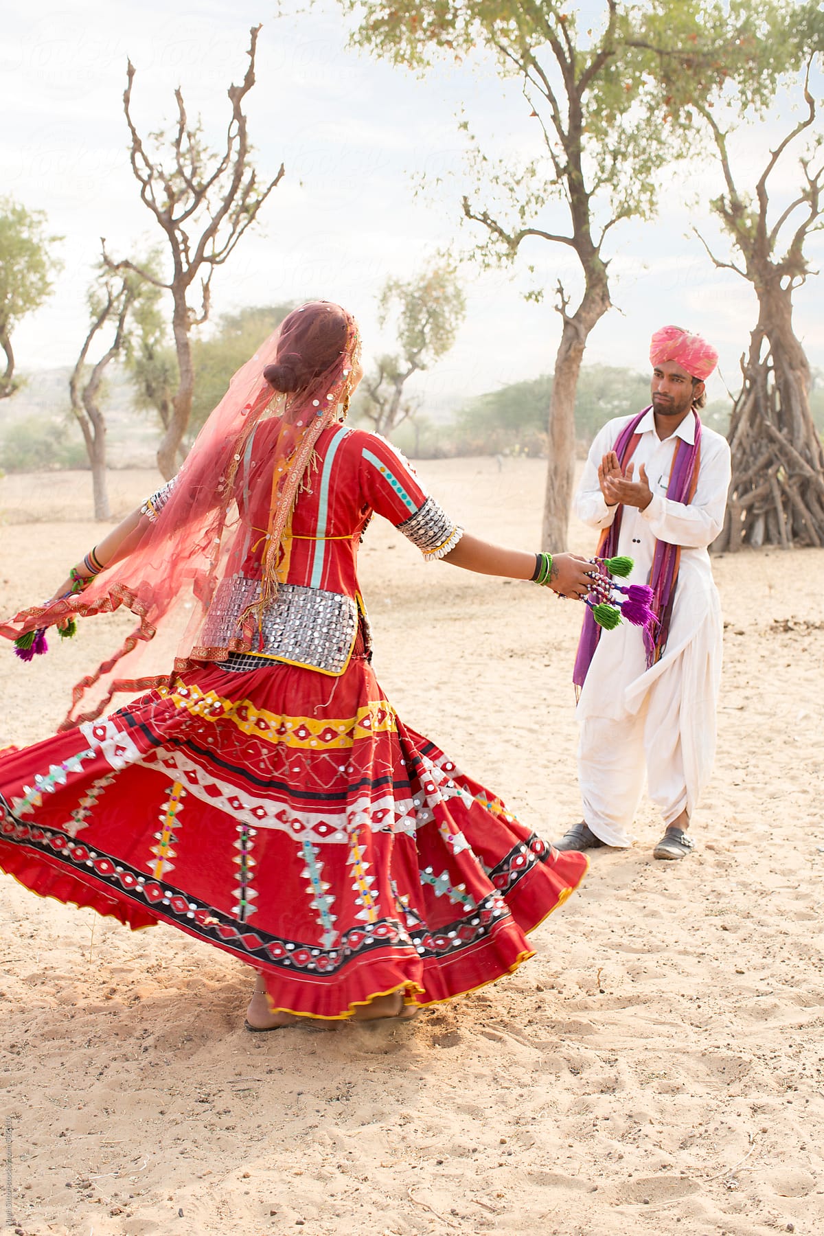 Traditional dancers performing in desert. Rajasthan. India.