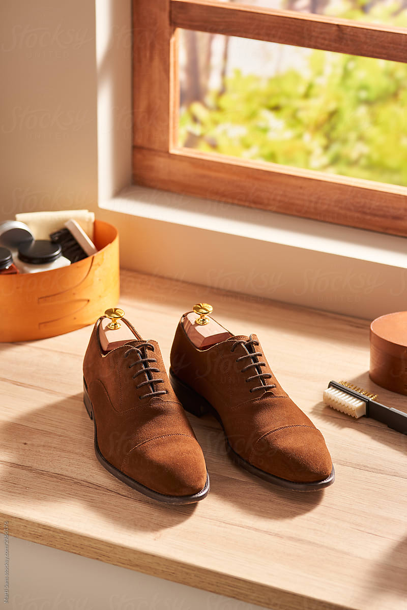 Clean suede shoes near window