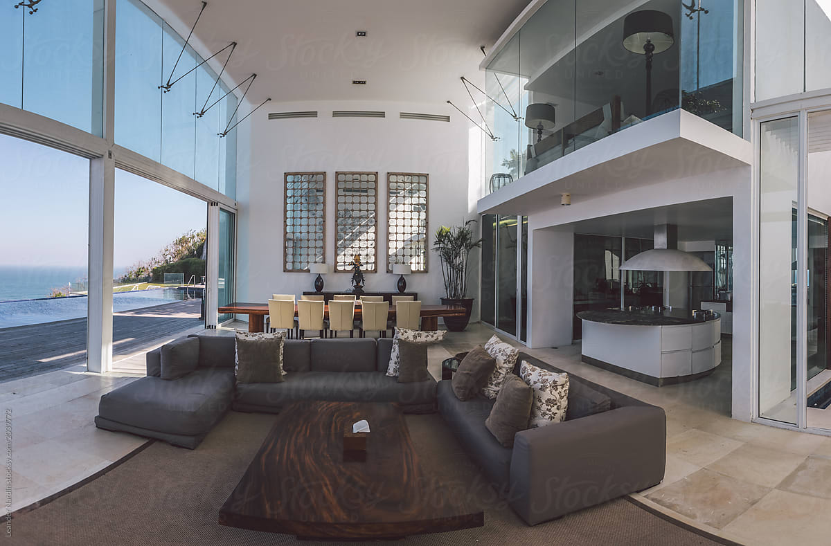 panorama of luxurious living area in a two storey villa with ocean view
