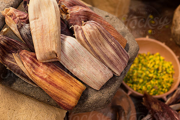 Tortillas On A Clay Comal by Stocksy Contributor Shava Cueva - Stocksy