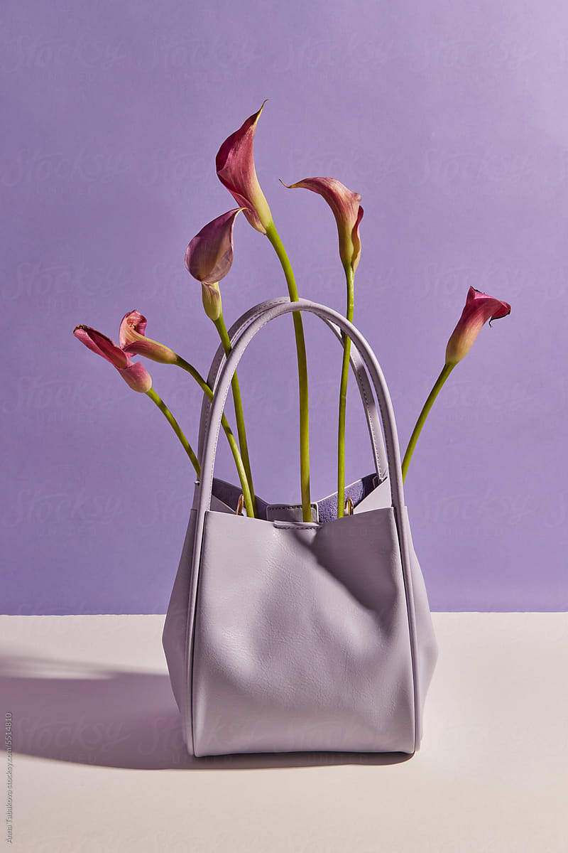 Purple bag with callas in it