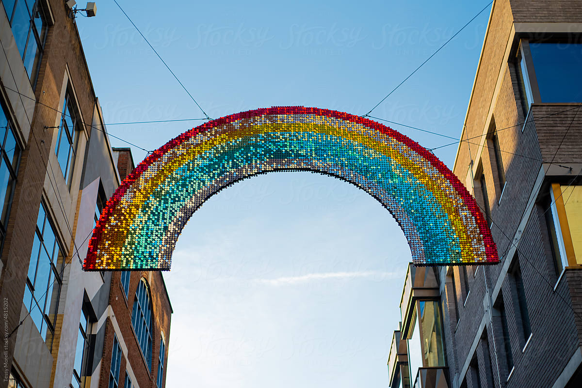 LGBTQ2+ rainbow street with sky