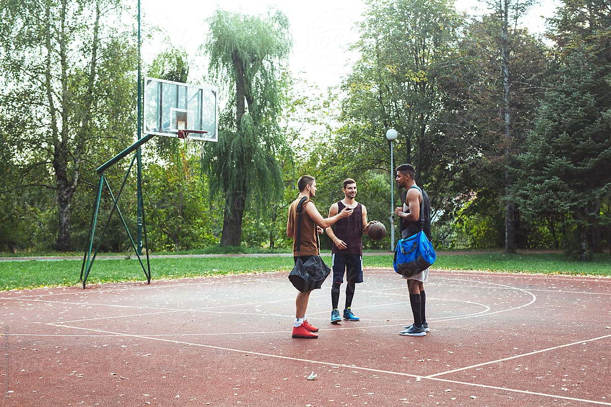 quot Men Gathering On Basketball Court quot by Stocksy Contributor quot Lumina