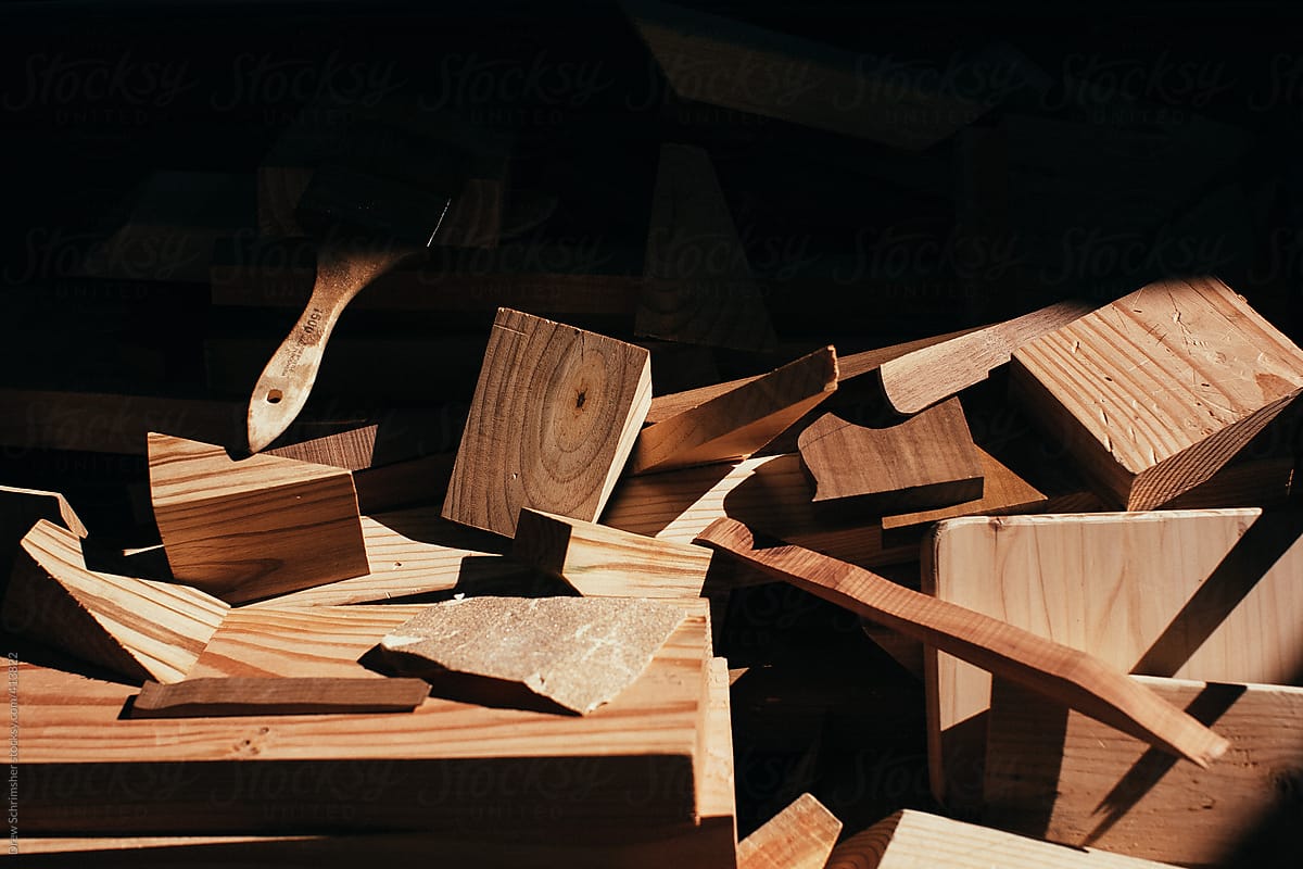 Pile of wood scraps in high contrast lighting